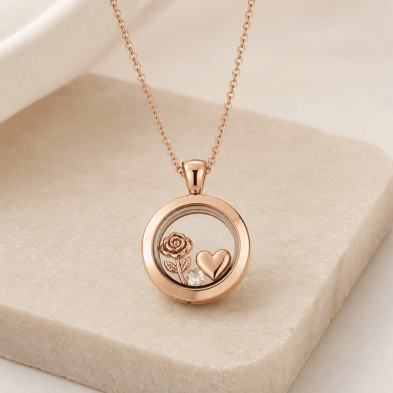Rose gold round living locket with rose, heart, and crystal charms